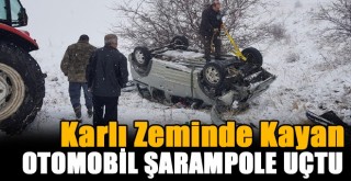 Karlı zeminde kayan otomobil şarampole uçtu